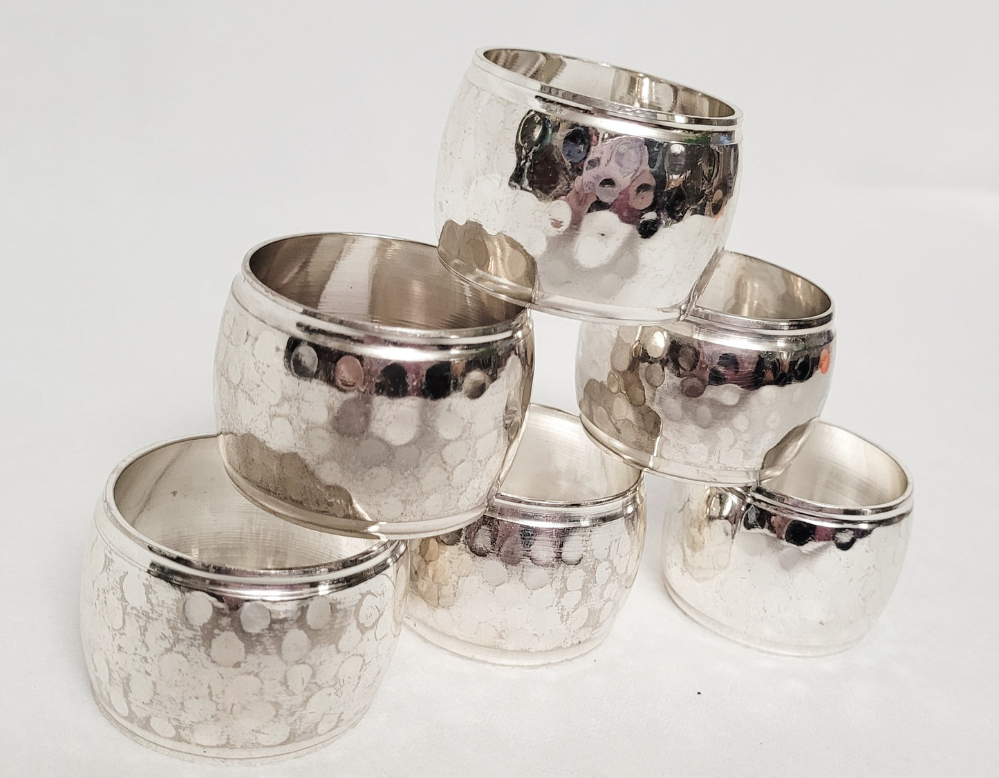 Six (6) - Hammered Brass/Silver Washed Napkin Rings