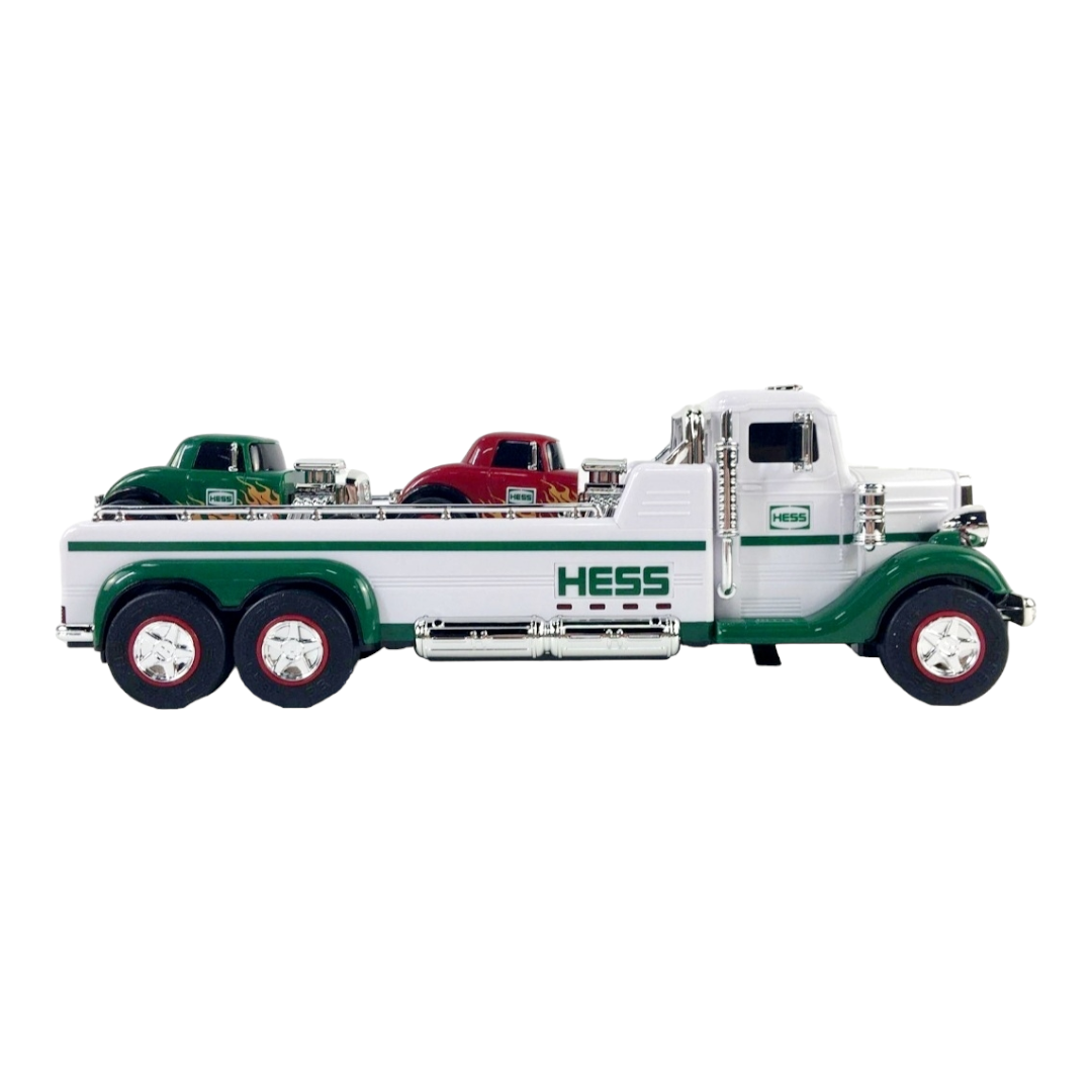 NIB *Hess FlatBed Truck w/ 42 LED Lights & 4 Sounds. Includes (2) Hot Rod Cars