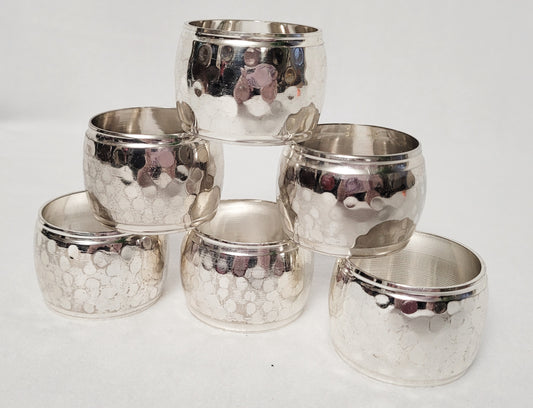 Six (6) - Hammered Brass/Silver Washed Napkin Rings