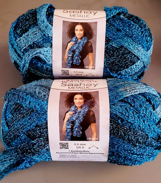 Two (2) Red Heart Reams of 'Sashay Metallic/Aquamarine' Yarn *NEW