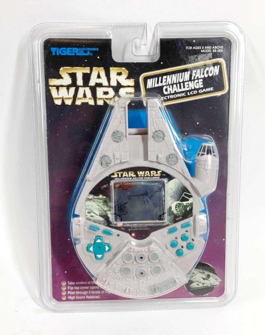 Vintage *Star Wars Millenium Falcon Handheld LCD Game (1997)
