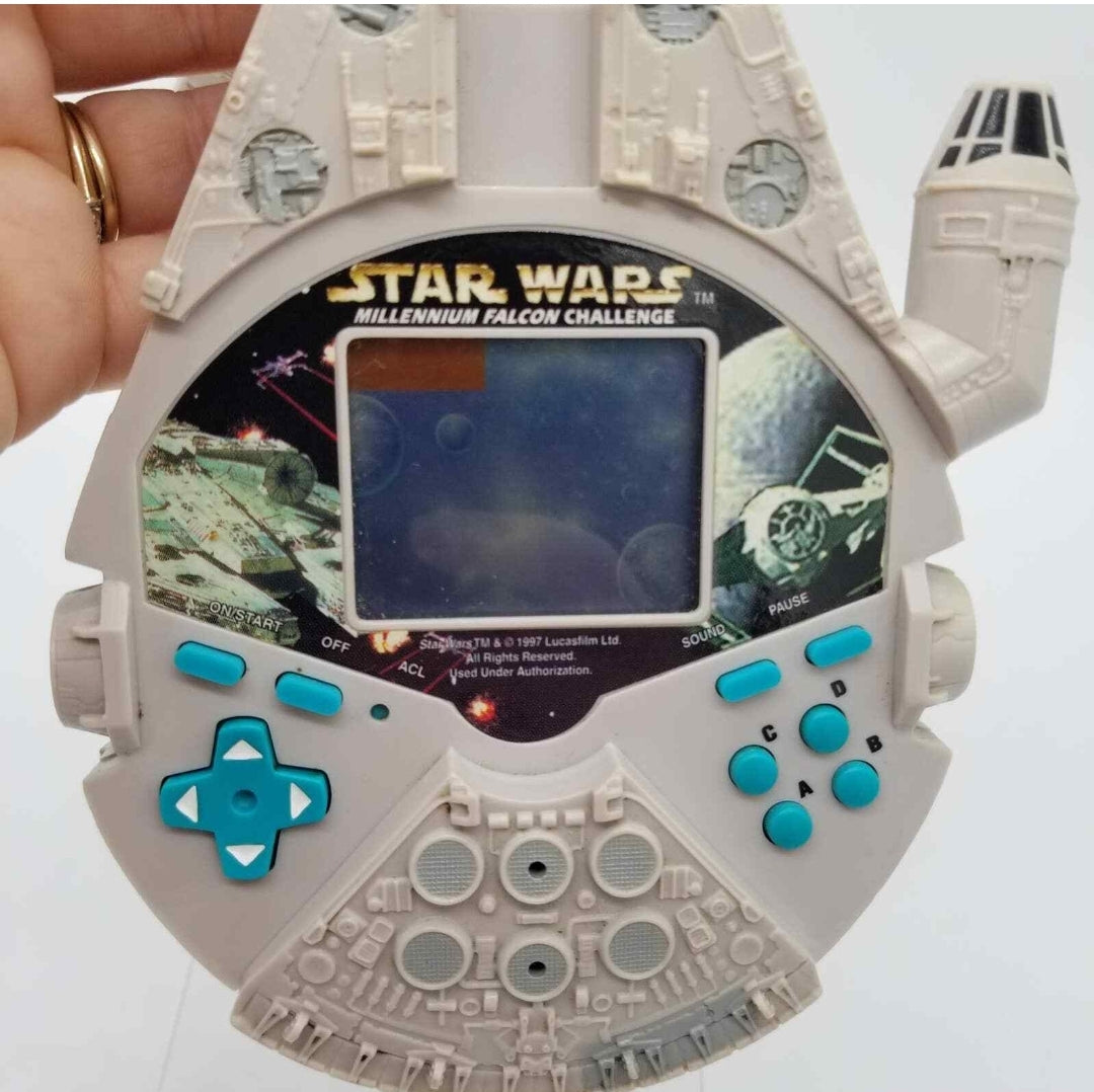 Vintage *Star Wars Millenium Falcon Handheld LCD Game (1997)