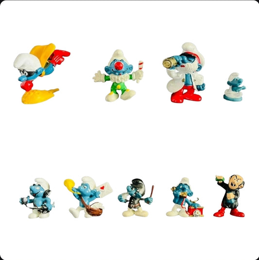 A Collection of Nine (9) Vintage Peyo Schleih Smurfs